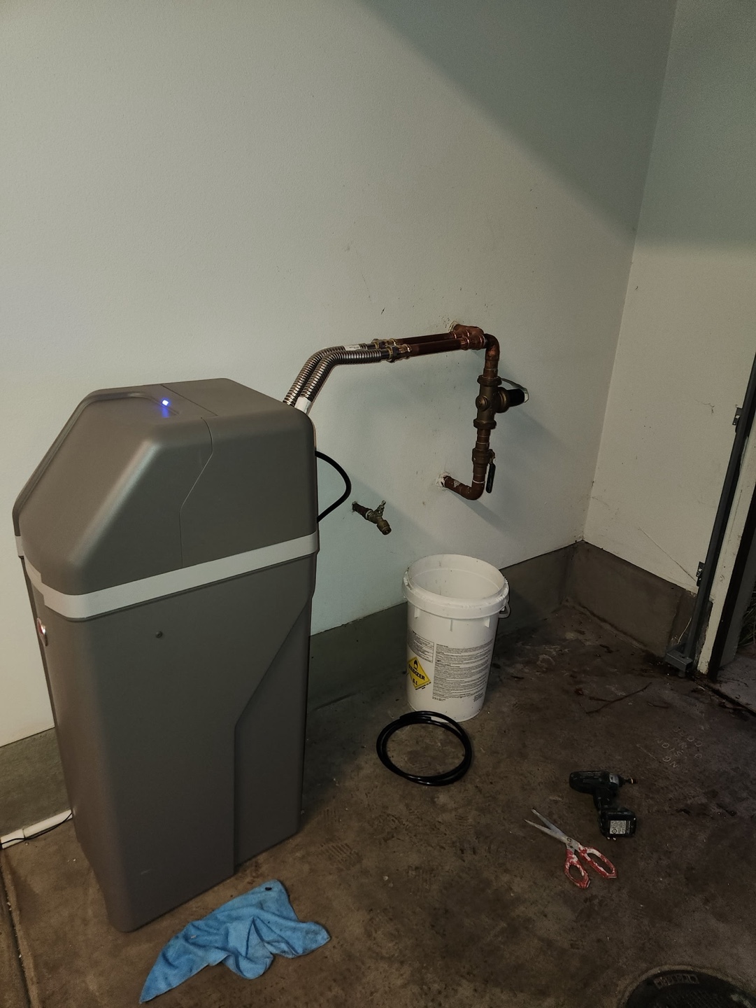 Water softener installed in a garage